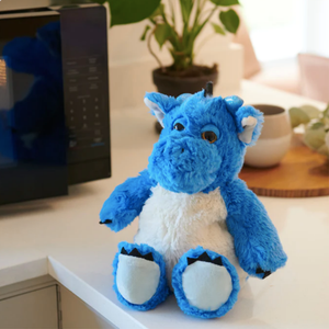 Blue Dragon - Warmies brand heatbag in front of a microwave