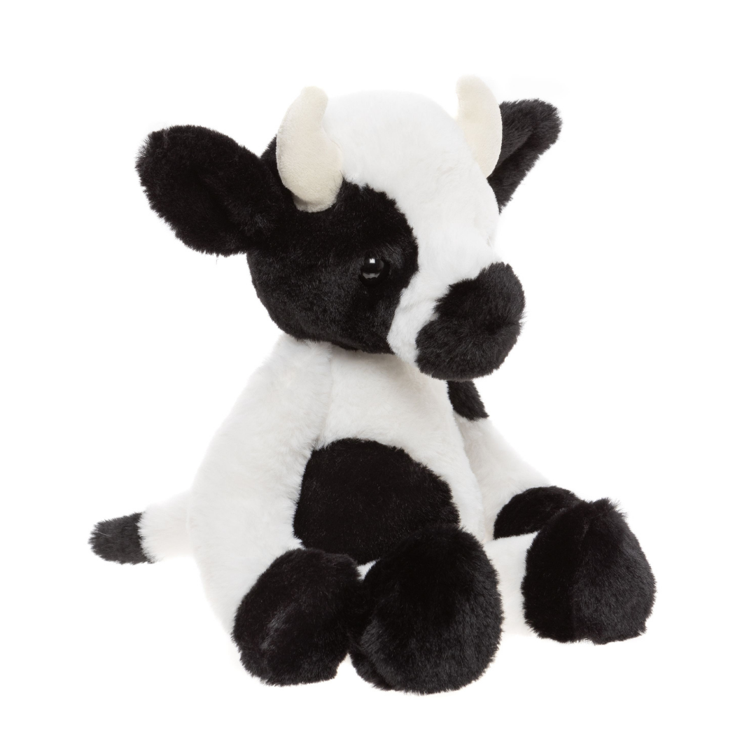 Plush cow toy with black and white pattern on a white background