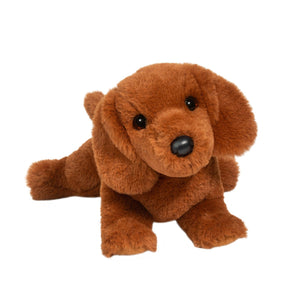 Brown plush dog toy on a white background