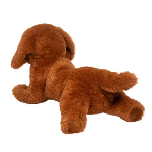 Brown plush dog toy on a white background