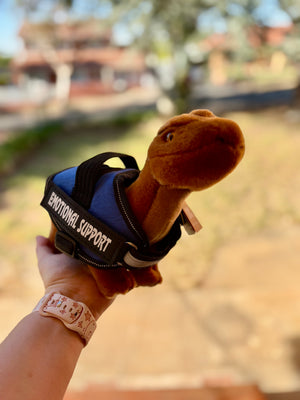 Diplodocus Living Nature Dinosaur Plush Emotional Support Stuffed Animal wearing a blue vest