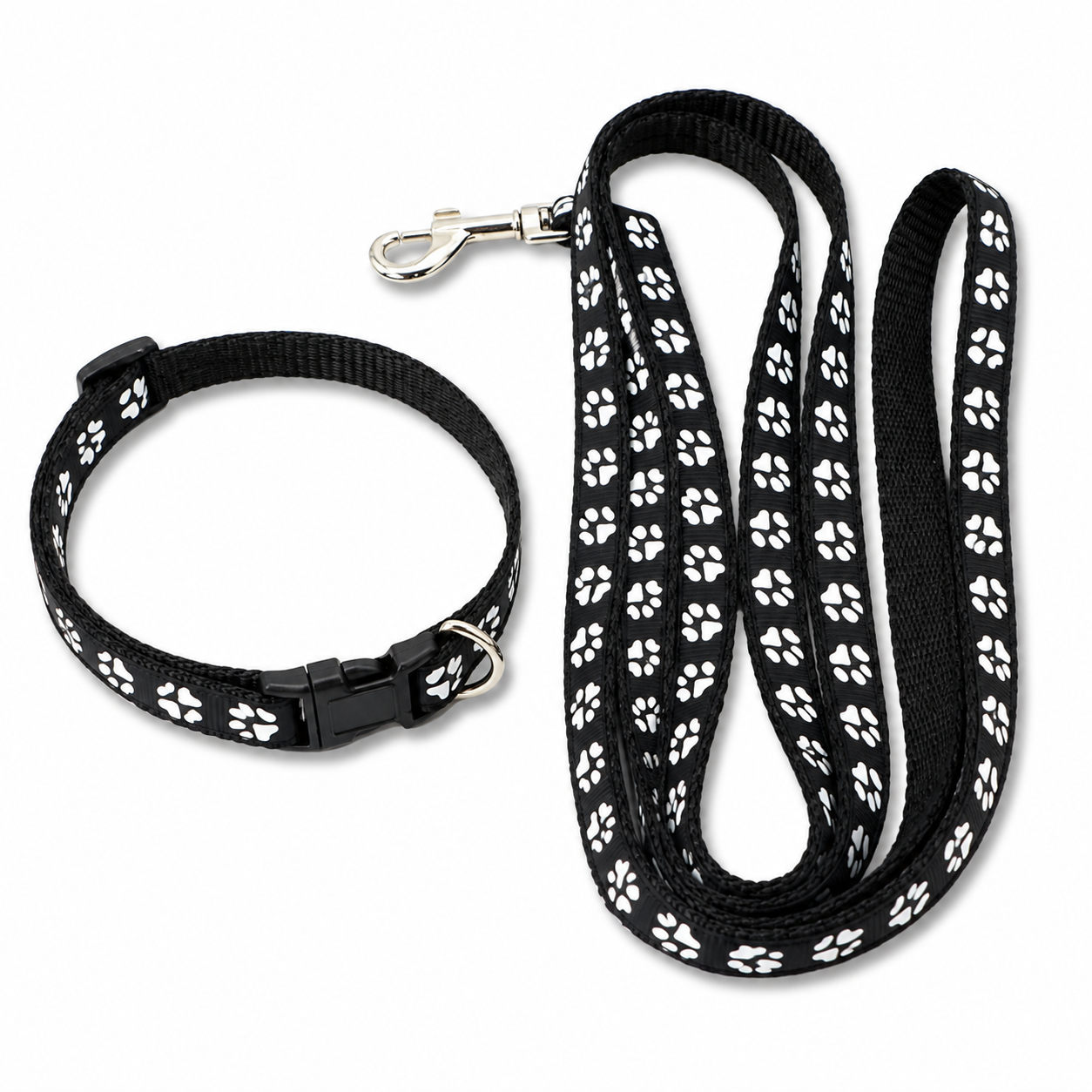 A black pet collar and matching leash set with a repeating white paw print pattern, shown on a clean white background.