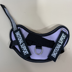Purple harness with 'Emotional Support' labels on a light gray background