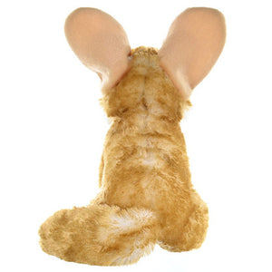 Plush toy resembling a dog with large ears on a white background