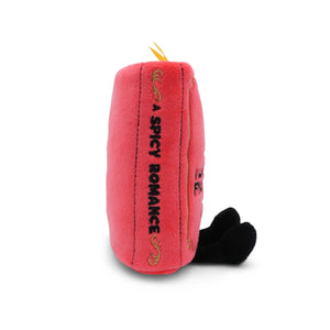 Pink dog toy with text on a white background