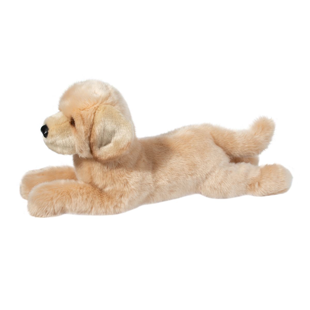 Plush toy dog lying down on a white background