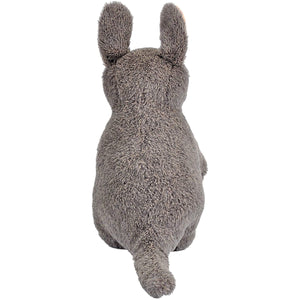 A gray plush stuffed bunny shown from the back, featuring upright ears and a soft textured fur surface, isolated on a white background.