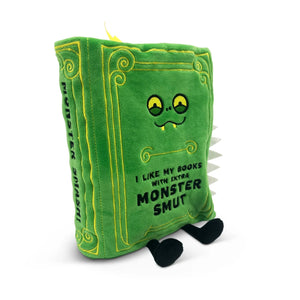 Green plush toy book with a monster face on a white background