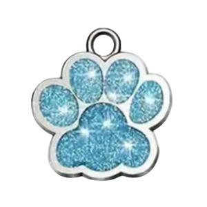 Blue glittery paw print charm on a white background