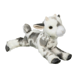 Plush toy goat on a white background