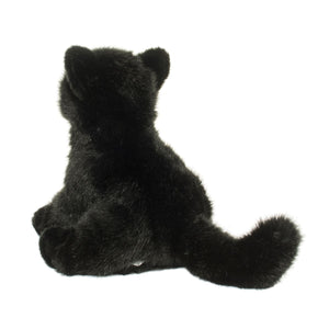 Black plush toy on a white background