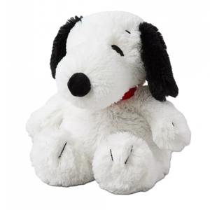 Plush toy resembling a black and white dog with a red collar on a white background