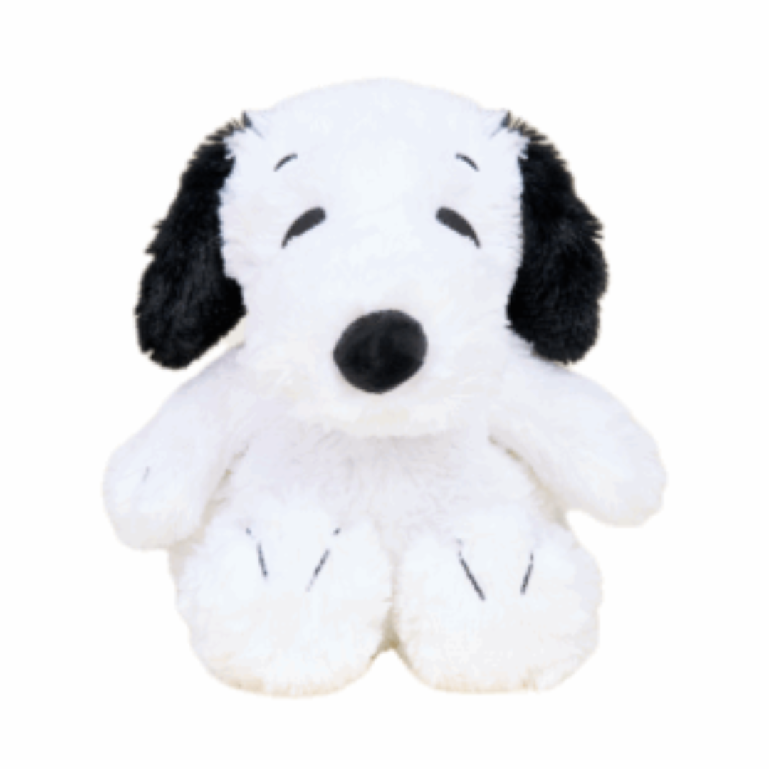 Plush toy resembling a black and white dog on a white background