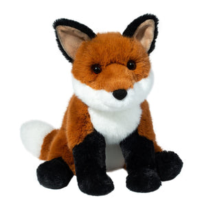 Plush fox toy on a white background