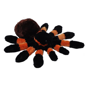 A plush toy tarantula spider with a dark brown fuzzy body and black and orange striped legs, isolated on a white background.