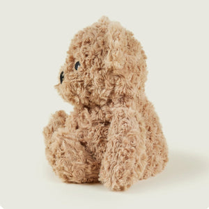 Plush toy duck with curly texture on a light background
