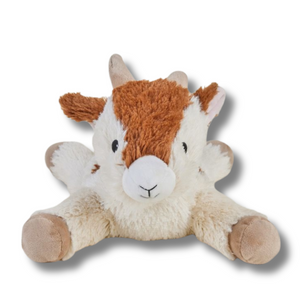 Plush toy goat on a white background