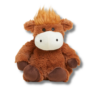 Brown plush cow toy with a white face on a white background
