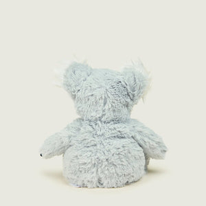 Plush toy resembling a fox on a light gray background