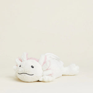 White plush toy with pink accents on a light beige background