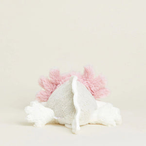 Unicorn-shaped plush toy with pink horn and mane on a light background