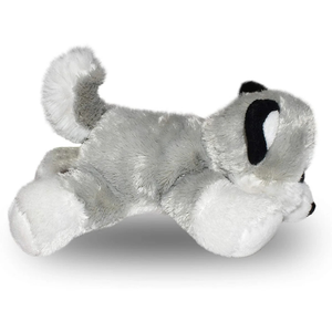 Plush toy dog lying on a white background