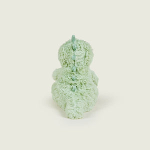 A mint green plush dinosaur toy shown from the back, featuring textured shaggy fabric and a matching spine detail, set against a solid off-white background.