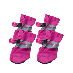 Pair of pink dog boots with gray straps on a white background
