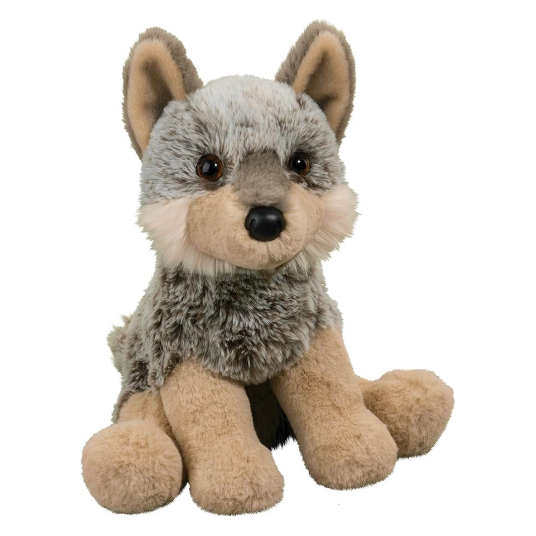 Plush toy wolf on a white background