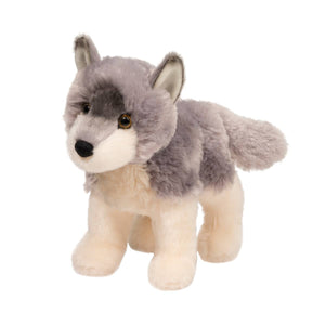 Plush toy wolf on a white background