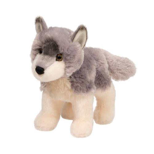 Plush toy wolf on a white background