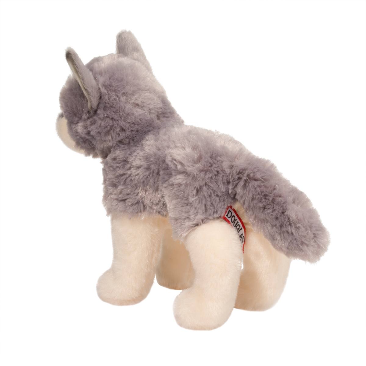 Gray plush dog toy with a red tag on a white background