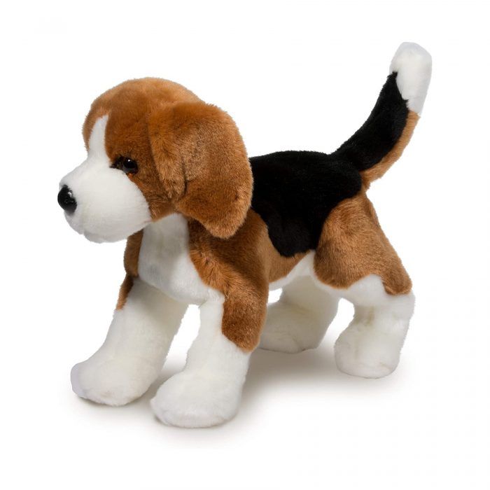 Plush toy dog with brown, black, and white fur on a white background