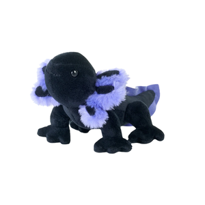 Black and purple plush toy on a white background