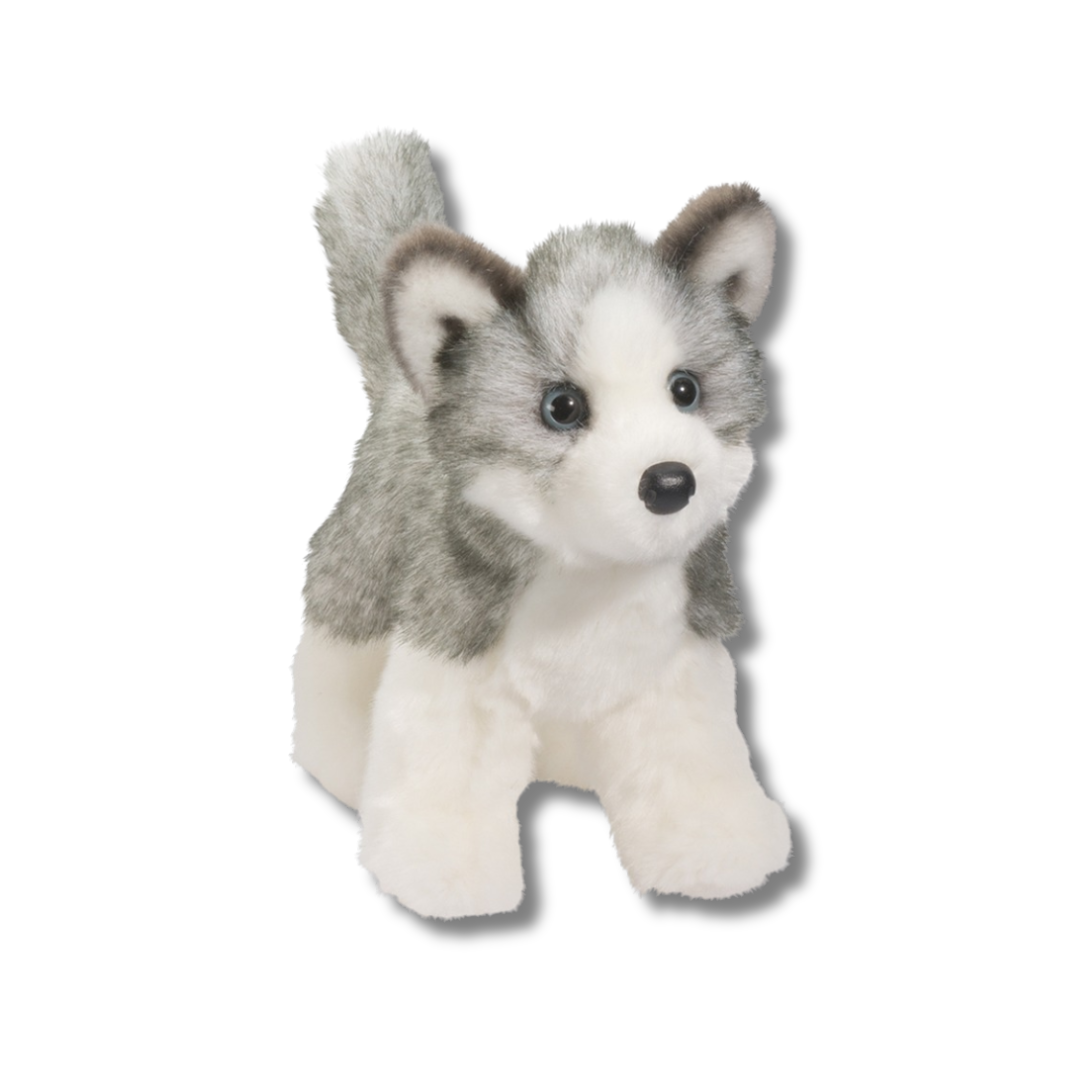 Plush toy husky on a white background