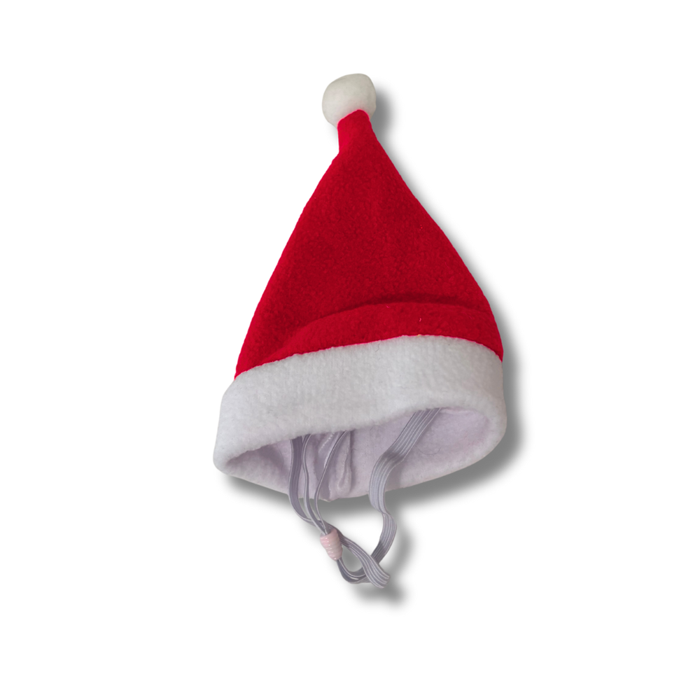 Red baby Santa hat with white trim on a white background