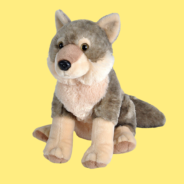 Plush wolf on a yellow background