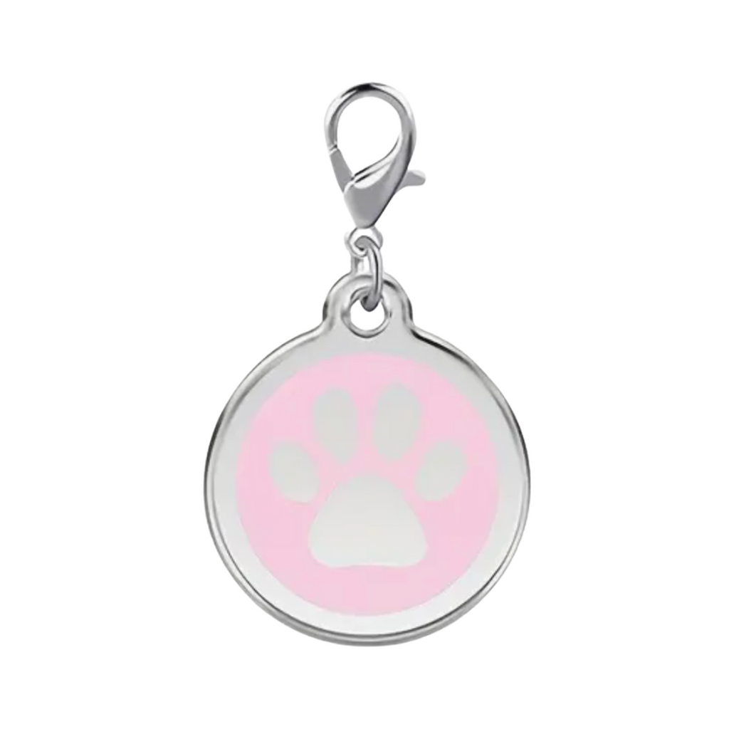 Round silver charm with pink background and white paw print on a white background