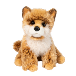 Plush dog toy on a white background