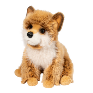 Plush toy fox with brown and white fur on a white background