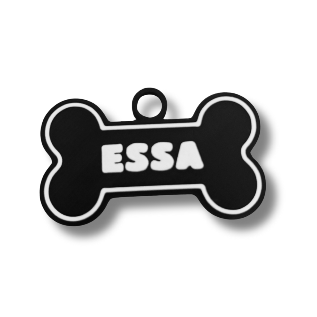 Black bone-shaped pet tag with 'ESSA' on a white background