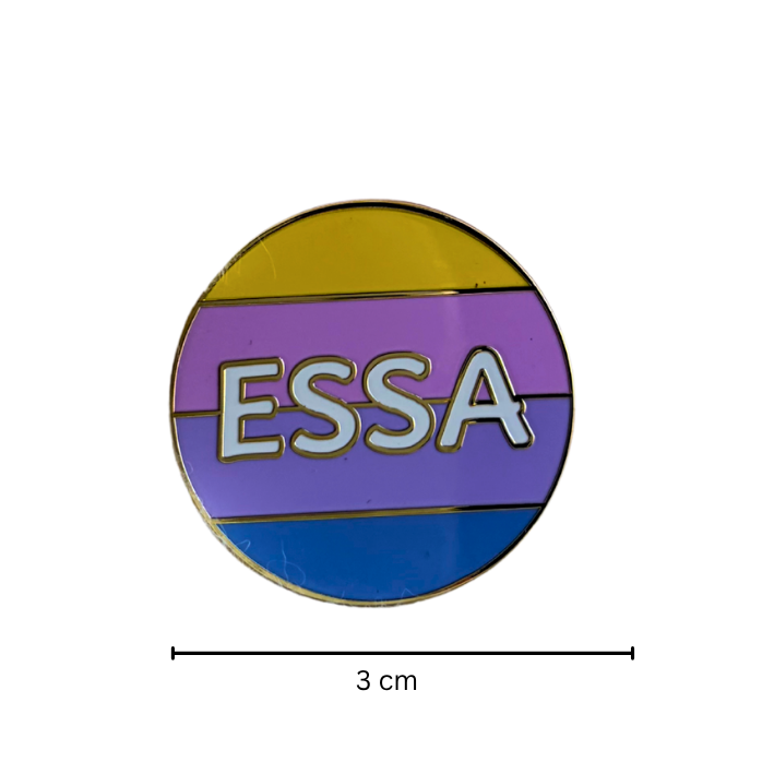 A circular enamel pin with the word 'ESSA' in white outlined letters over horizontal yellow, purple, and blue stripes, shown on a white background with a 3 cm width marker below.