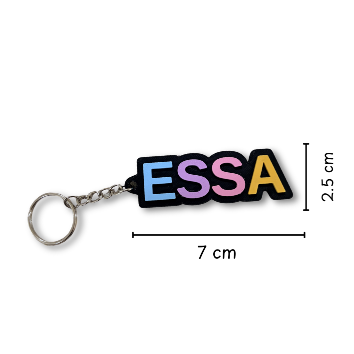 A colorful lettered keychain spelling 'ESSA' with a silver split ring and chain, shown on a white background with dimension lines indicating 7 cm width and 2.5 cm height.