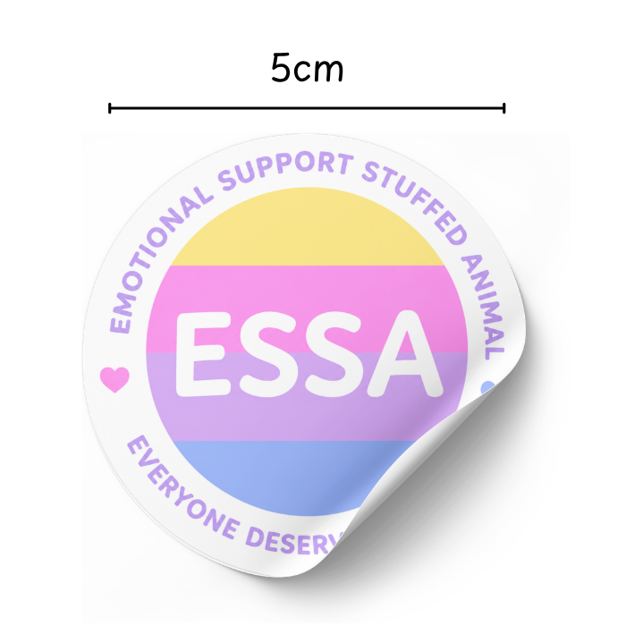 A circular sticker with a peeled-back lower right corner, shown on a white background with a dimension line above indicating 5cm width. The sticker features the text 'ESSA' in white over horizontal pastel stripes in yellow, pink, purple, and blue, with purple text around the border reading 'EMOTIONAL SUPPORT STUFFED ANIMAL' and 'EVERYONE DESERVES'.