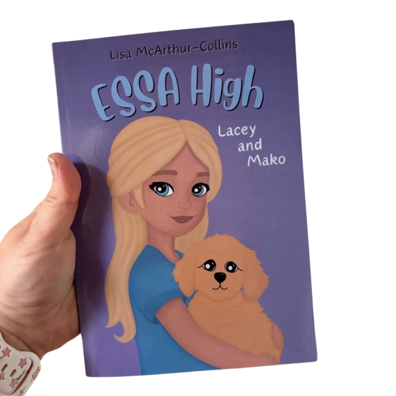 ESSA High Book 3 in the series. Lacey and Mako. A hand is holding the book up.