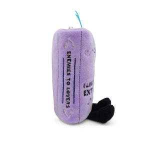 Purple plush toy with text on a white background