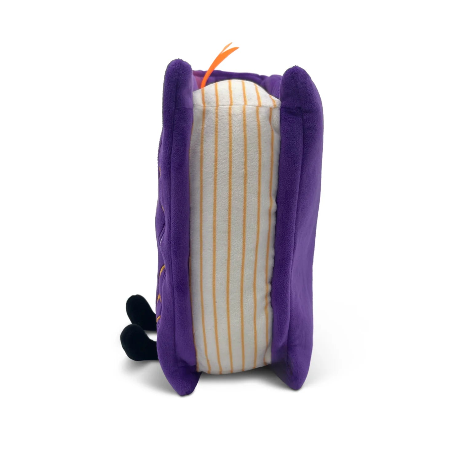 A plush toy shaped like a sandwich, featuring purple plush outer layers, a cream-colored center with thin orange stripes, and small black feet at the bottom, shown on a white background.
