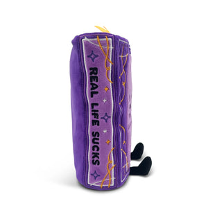 Purple plush toy with 'Real Life Sucks' text on a white background