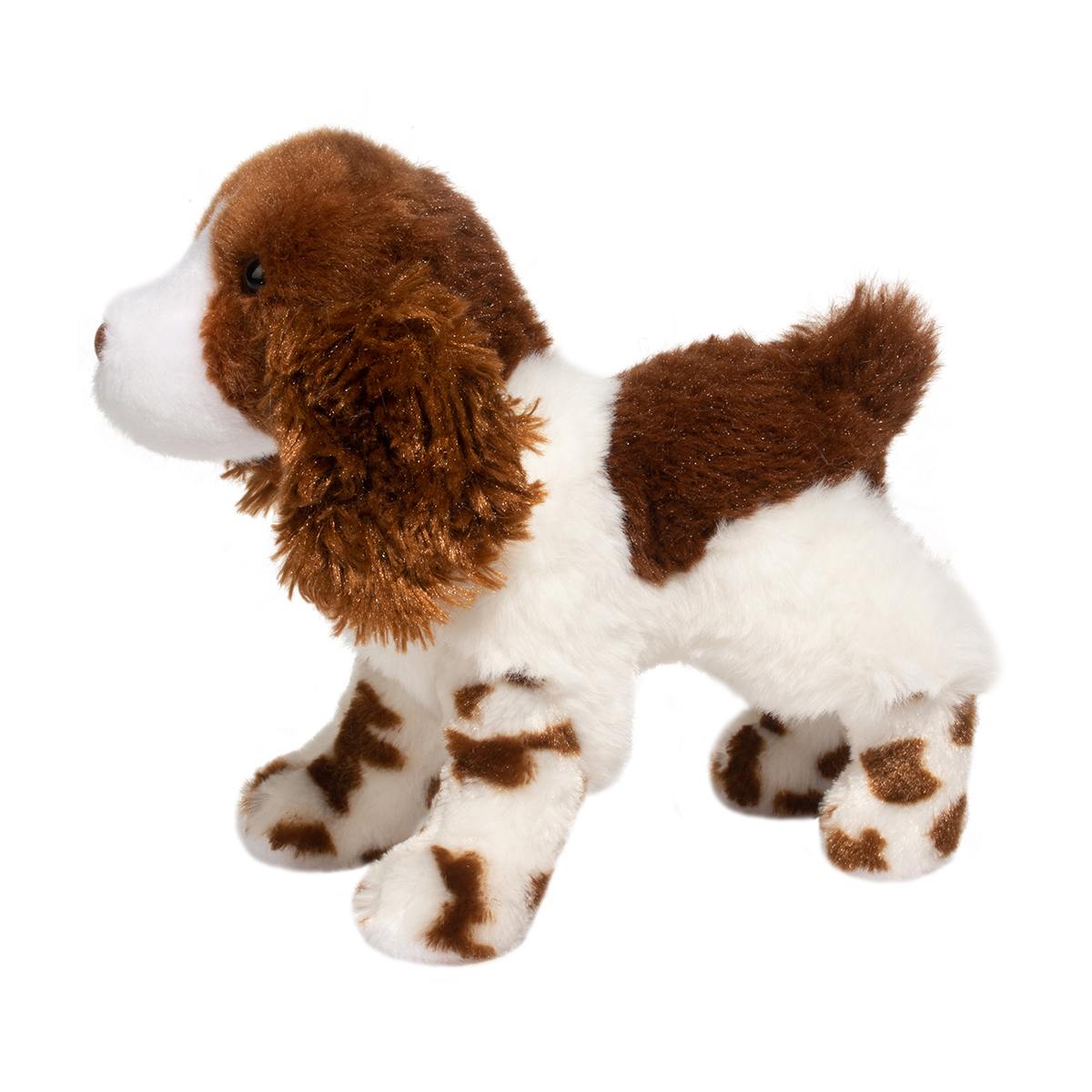 Plush toy dog with brown and white fur on a white background