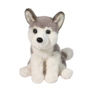 Plush toy husky dog on a white background